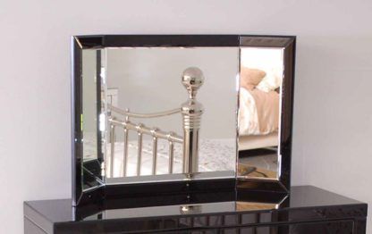 1ff6428f2a2dc00e4b73aea735ef1f4d00fb3b3d2d1fa2152d6b63dae0b210d4.jpg An Image of ELLY Black Glass Triple Folding Mirror