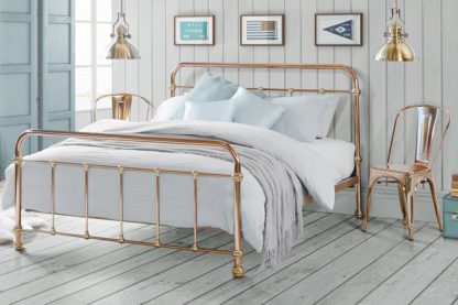 28e5da28317234e479beb94a155a35f4e5dda0f2db7fbdb8c3cb1cfb1df50fcb.jpg An Image of Martino Copper and Brass Dormitory style Bed