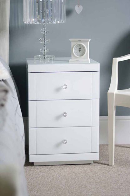 317fee1143eeb6783d90d2814ef87487001b4e652116f09711486e9d25daab99.jpg An Image of Pair of LUCIA White Glass Bedside Tables with 3 Drawers