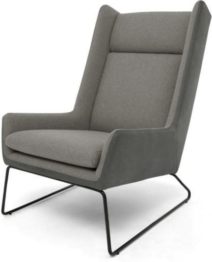 344d826fecdaf606d955bc96509daed972b6a31a3fe151028f9cf5e80175d425-1.jpg An Image of Hicks Wing Back Armchair, Anthracite Grey Leather with Pheasant Grey fabric