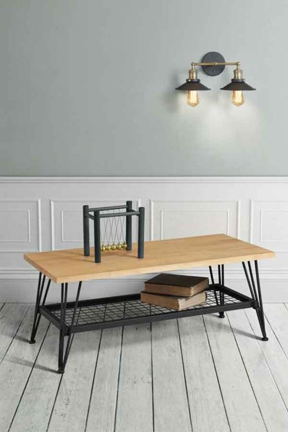 An Image of Felix Industrial Coffee Table - Solid oak and steel