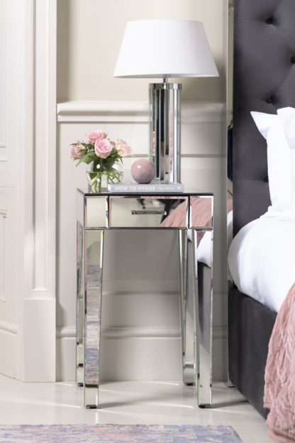 5eef0c24f9eb56769ae1a64b1766fca1ca9f79137d091a2c28e64c47130d5e27.jpg An Image of ZOE Mirrored Bedside Lamp Table with Single Drawer