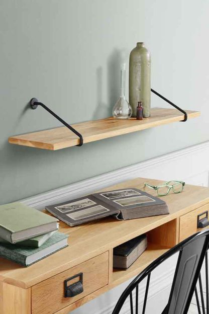 8c7465bb8df92371c33ada70c4d584a5c80c426e3b8b0b721fbe73d8aea60255.jpg An Image of Felix Industrial Shelf - Solid oak and steel