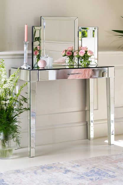 ae018b4c6c145e9d5137347e072534551895e357c1f21c1ecc151daf805a89f3.jpg An Image of ZOE Mirrored Dressing Table with Single Drawer