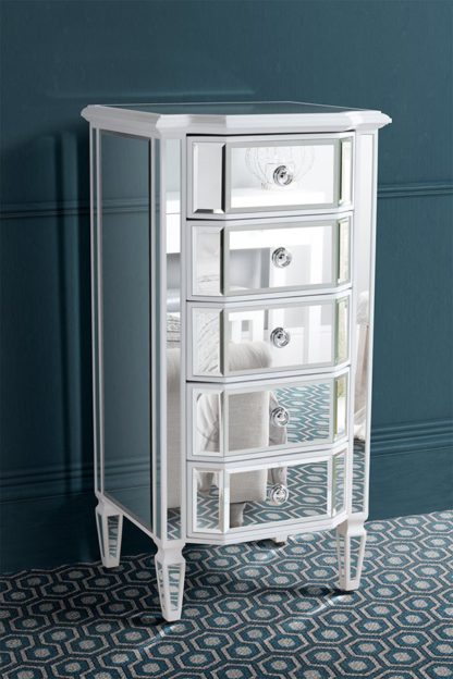e294c52b1cdadc2807de136122cf22249841837d56f1e533d369aadcb80456f7.jpg An Image of Leonore Tall Chest
