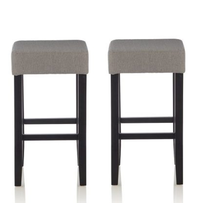02a74f9458fe811c9f8846cc61ec3e55147e3052ba6be47dbb8974f89bec7220.jpg An Image of Newark Bar Stools In Light Grey Fabric And Black Legs In A Pair