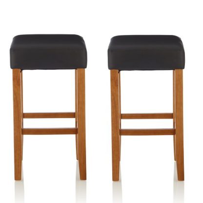 09cc159597a32392889e8cab2a26a7a77c43aaf744373cae2968bff4087f8ec8.jpg An Image of Newark Bar Stools In Black PU And Oak Legs In A Pair