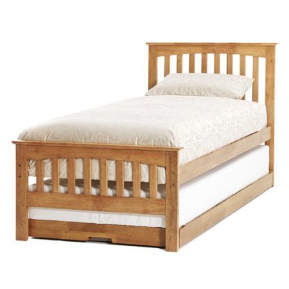 An Image of Amelia Hevea Wooden Single Bed And Guest Bed In Honey Oak