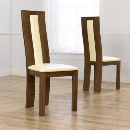 0c69903b6d9b19e3b2da57b6ff8886f4cd02aa58afbf84f5fb2ae4be42994466.jpg An Image of Marila Dining Chair In Cream PU With Dark Oak Frame In A Pair