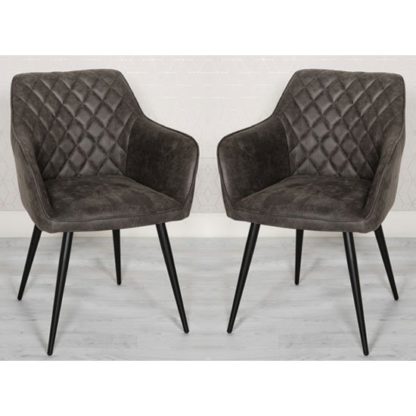 0ec29c31441ef77c3a856445476123f6dd197aeba53a624f8124aa823f625d66.jpg An Image of Charlie Grey Faux Leather Carver Dining Chairs In A Pair