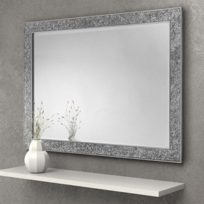 103e50f1d7aad9e25f2033d849b28390ea7cb7f4bd94443b0fb028fc347257bb.jpg An Image of Staccato Fragment Wall Bedroom Mirror