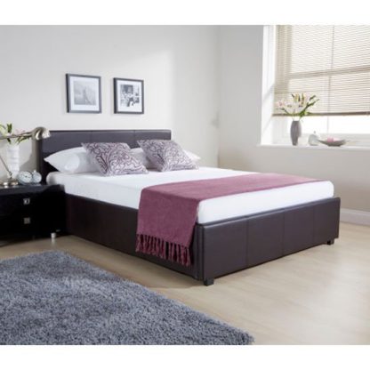 11548f5a3c6f8fc71314c235178f5d5b5f0c2c51e0495414218486ebb2f31854.jpg An Image of Side Lift Ottoman Faux Leather Small Double Bed In Brown