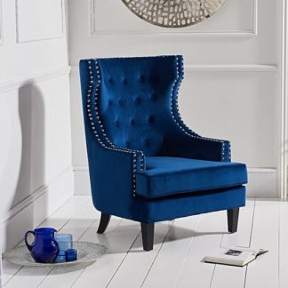 An Image of Irina Modern Accent Chair In Blue Velvet With Black Legs