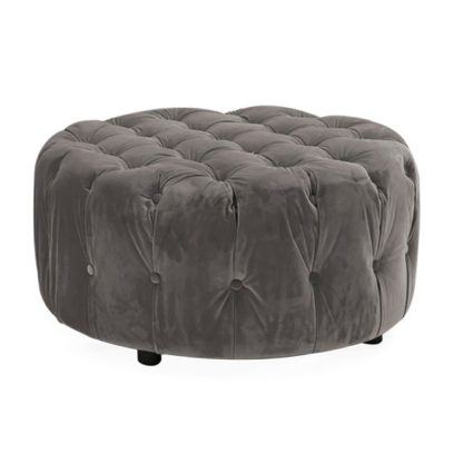 1613bd70431a76e43a8b7795c2b045bc3912345286209fdaad3e98ba7c6e5d11.jpg An Image of Reedy Velvet Deep Buttoned Foot Stool In Grey Finish