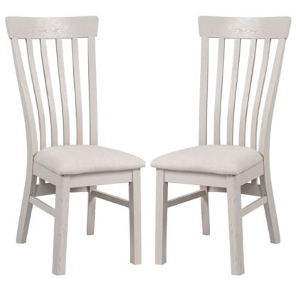 An Image of Leanne Wooden Dining Chairs In Stone Washed White In A Pair