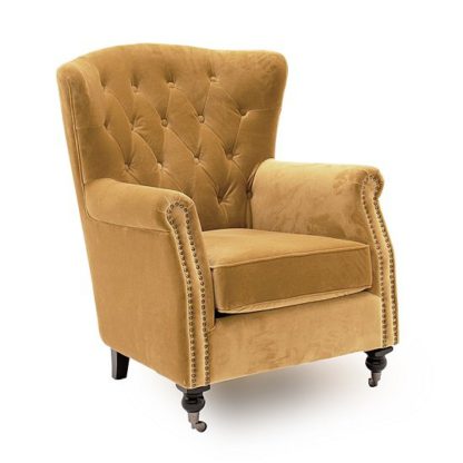 An Image of Reedy Velvet Wingback Chair In Mustard With Metal Castor