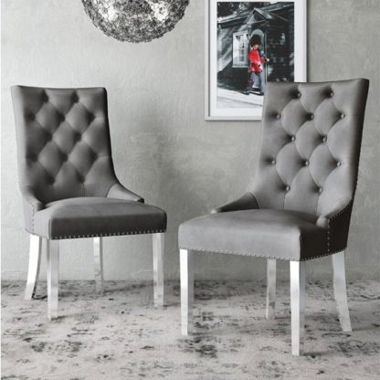 1997424b035f90b43cac470d47d2f2c42204cc49c151f86ba7fdbfec06f79526.jpg An Image of Donatello Silver Grey Velvet Fabric Dining Chairs In Pair