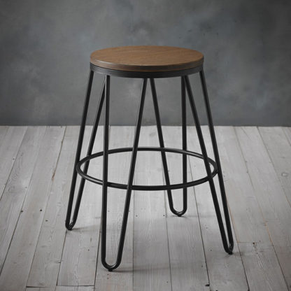 1d9a7eaa34b4a48e29a4767dad71bc5c72ccdccca0aaa73fd6068e5a0b822825.jpg An Image of Ikon Black Metal Hairpin Leg Bar Stool With Wooden Seat