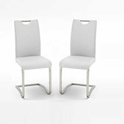 1f82467f65a374300b5865b6bffb59d1598bb97ff1a8116d2294db38a496932d.jpg An Image of Koln Dining Chair In White Faux Leather in A Pair