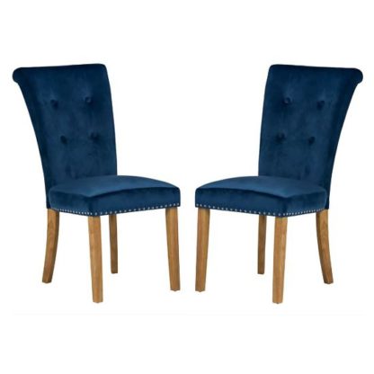An Image of Wodan Velvet Dining Chair In Blue With Oak Legs In A Pair