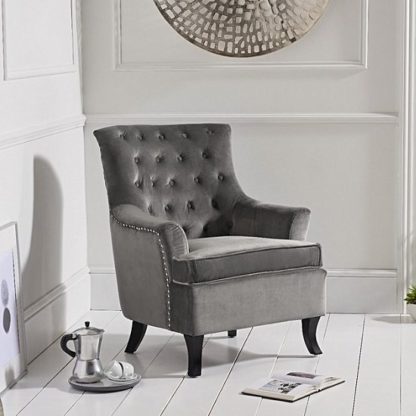 27fe53d673f7ec83cc3762befa1dab0079e5fd461fe0bc7da5acccd184ac5541.jpg An Image of Bartow Modern Accent Chair In Grey Velvet With Black Legs