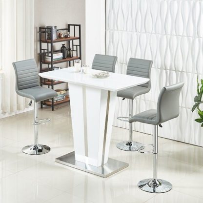 29c14e7eeb3bbd56840091a1ce365345817c5e9935d51a819b4812cacb56bcb4.jpg An Image of Memphis Glass Bar Table High Gloss White 4 Ripple Grey Stools