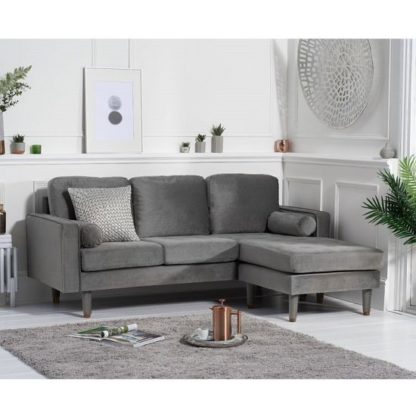32ee68410adab65ece653877b9663c6b7440935eb213c918a97696b2cdb22fb5.jpg An Image of Garren Reversible Three Seater Chaise Sofa In Grey Velvet
