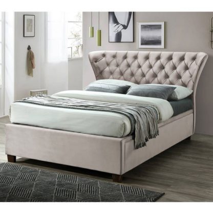 32f97020c0501b86634301711d5441efb139847e4bfde692c7379e51163dd59b.jpg An Image of Georgia Ottoman Fabric King Size Bed In Champagne