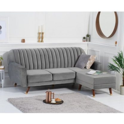 347c8b49d33a71f75de52844f379e1107bfab981778218ca1690ddaf8582edbb.jpg An Image of Corwin Velvet Sofa Bed In Grey With Angled Solid Wood Feet