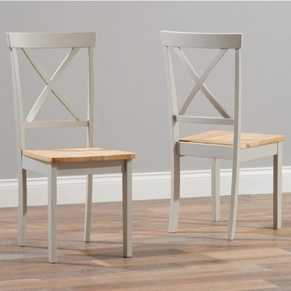 3a2e1eba658122ea8cc7a3a153b79f97cb9092d9679507bd65a7c838be99ca9a.jpg An Image of Chertan Wooden Oak And Grey Dining Chairs In Pair