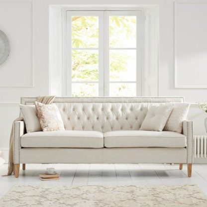 3c083000be579baff3b138f6748a8a88c9e042f2a01f6fa5626e4345c1354e94.jpg An Image of Bellard Fabric 3 Seater Sofa In Ivory White And Natural Ash Legs