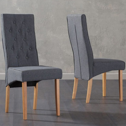 3c085bb8cf9c4ae16ae03ef5f9e80fe74df6c19f52071b5720b8675b83d490fa.jpg An Image of Caph Grey Fabric Chairs In Pair