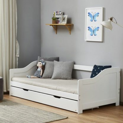 3e17371f69780bc65ecff55f314044f2a53c9a43af0e8d6aa5c61415643de4d1.jpg An Image of Tupelo Wooden Single Bed In White With Pull Out Trundle