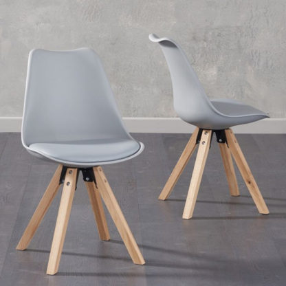 3ede7b1d0cb88c639be42a55c647abf159329e78ac9ae4b0371c5e0e47b79506.jpg An Image of Tupa Light Grey Faux Leather Chairs In Pair With Square Leg