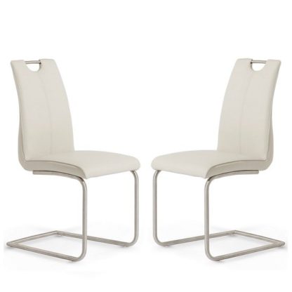 40d0ab6a30270ae18ee58c96ec49c1c4390fd905a00d8bed10edb60c70dcbe51.jpg An Image of Harley Dining Chair In Taupe Faux Leather In A Pair