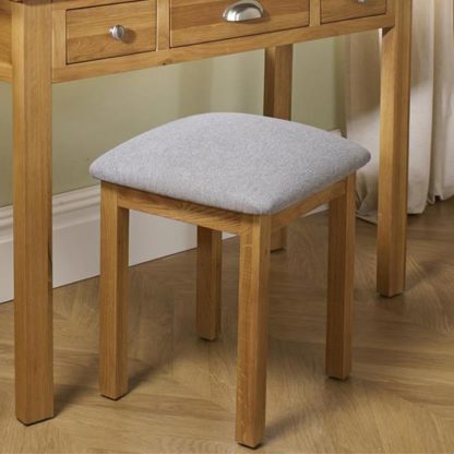 An Image of Woburn Wooden Stool In Oak With Fabric Seat