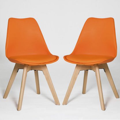 An Image of Regis Dining Chair In Orange With Wooden Legs In A Pair