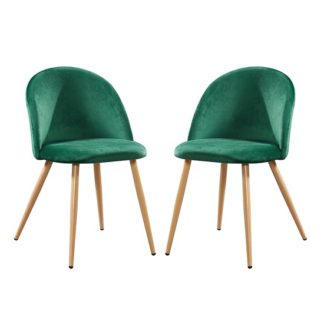 An Image of Swart Velvet Dining Chairs In Green With Oak Legs In A Pair