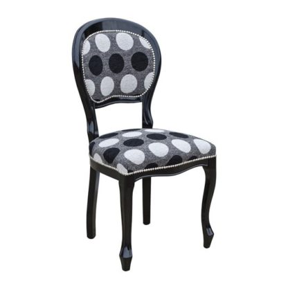5161fbee5d4374e7b6b8abb52cbdd790d030684fb47e7e214cb36c2d91514344.jpg An Image of The Spoonback Contract Dining Chair With Wooden Frame
