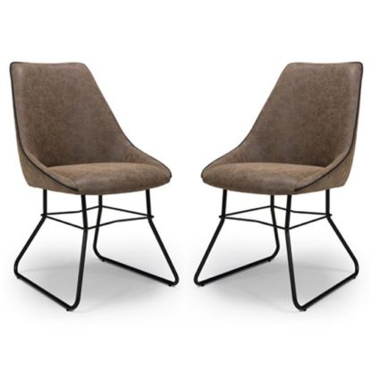 517f04f7b019d554f10e5ad5bdc7b0a639e285bf2b773c0634ea011ed2b2e6e9.jpg An Image of Cooper Wax Tan Faux Leather Dining Chair In A Pair