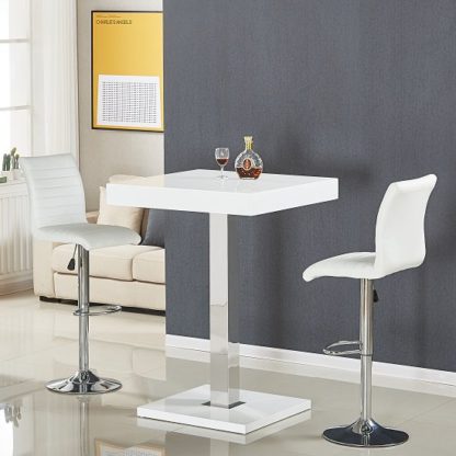 56992d816bc24650823f59530689bc294a8fa489920bf54ef77f2c449f9e3b41.jpg An Image of Topaz Bar Table In White High Gloss With 2 Ripple Stools