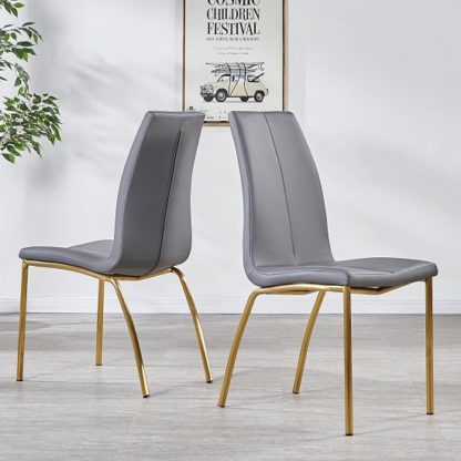 5807001ecb42fe6ce0d9532885f2071989ba49c03d7891389da435ba42ccca5c-1.jpg An Image of Opal Dining Chair In Grey PU With Brushed Gold Base In A Pair