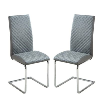 58de8342b3556fbb590b5b6be2ab3e6da9bab0f1148959546bb99c76a4f096b4.jpg An Image of Ronn Dining Chair In Grey Faux Leather In A Pair