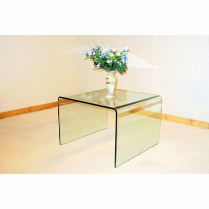 59506b22e8c4478095896c0a94c825a0b8404f200d4ae96458f6e2bf99390a1d.jpg An Image of Angola Bent Clear Glass Lamp Table