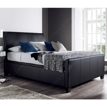 5c076c3a7a8e4b03119fa1ebd8025ed7c34a8698f7e1e7e0a34f7d861eb6fbdc-2.jpg An Image of Madea Ottoman Storage Super King Bed In Black Bonded Leather
