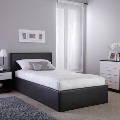 5c6de24e6d07a97615580556776578baa25130ae234bb035daccce903704b771.jpg An Image of Side Lift Ottoman Faux Leather Single Bed In Black