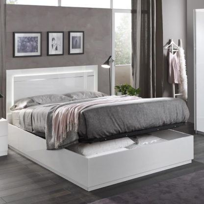 An Image of Abby King Size Ottoman Bed In White High Gloss And Lights