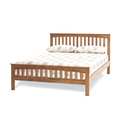 An Image of Amelia Hevea Wooden King Size Bed In Honey Oak