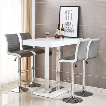 61990ce31d0e02115d9c175de7bd7a6190c1c9cc16d1ab3b1cad55500e9eca9b.jpg An Image of Caprice Bar Table In White High Gloss With 4 Ritz Grey Stools