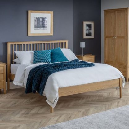 An Image of Cotswold Wooden King Size Bed In Oak